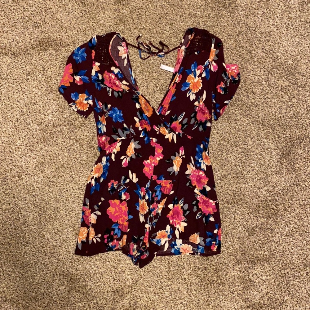 Burgundy romper with floral print